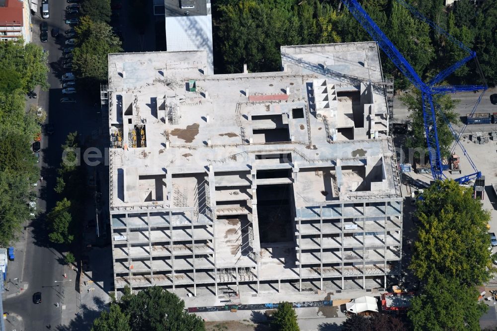 Aerial photograph Berlin - Partial demolition and reconstruction of the former department store building Kaufhof - Centrum Warenhaus on Hermann-Stoehr-Platz - Koppenstrasse in the district Friedrichshain in Berlin, Germany