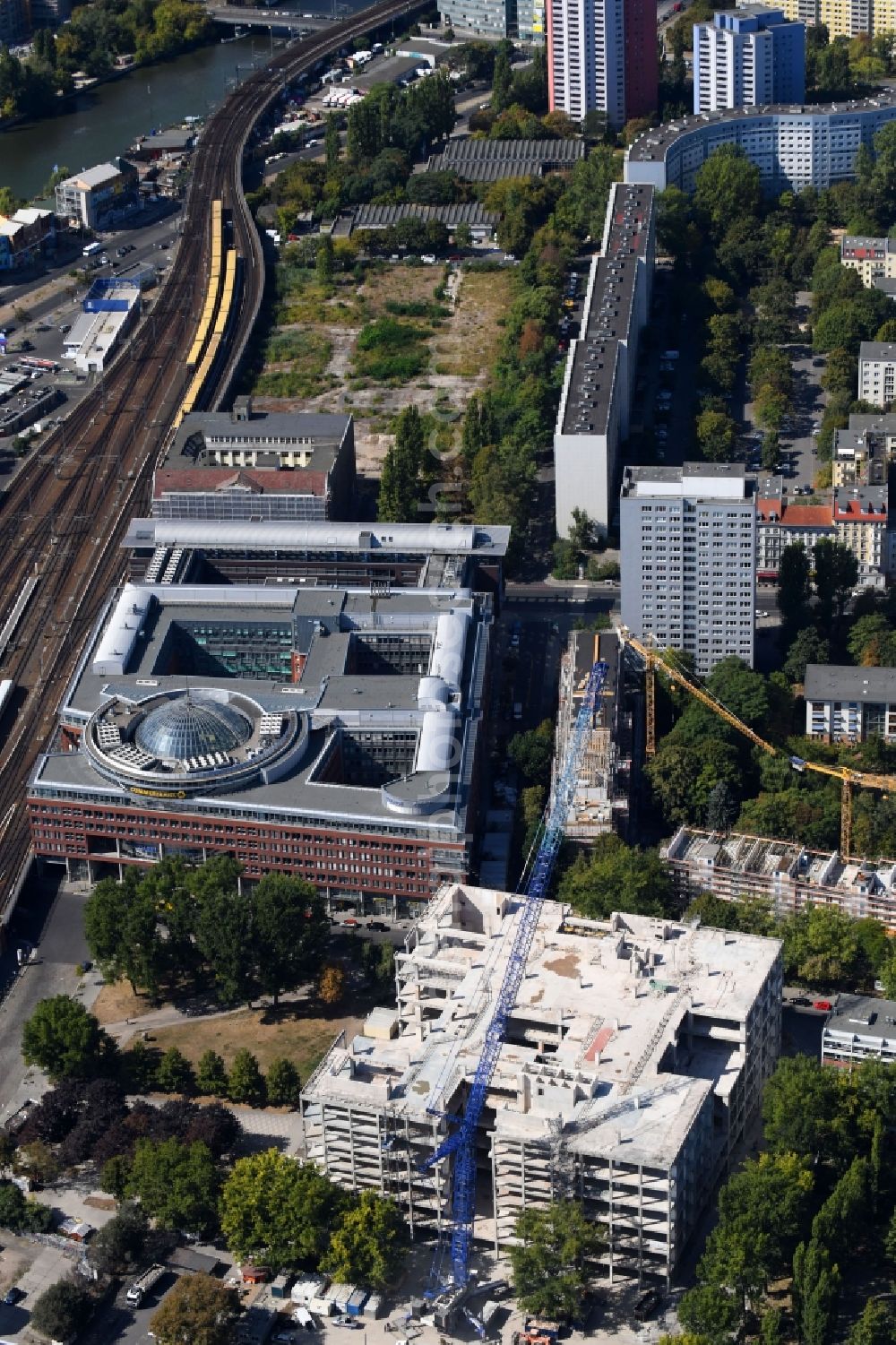 Berlin from above - Partial demolition and reconstruction of the former department store building Kaufhof - Centrum Warenhaus on Hermann-Stoehr-Platz - Koppenstrasse in the district Friedrichshain in Berlin, Germany