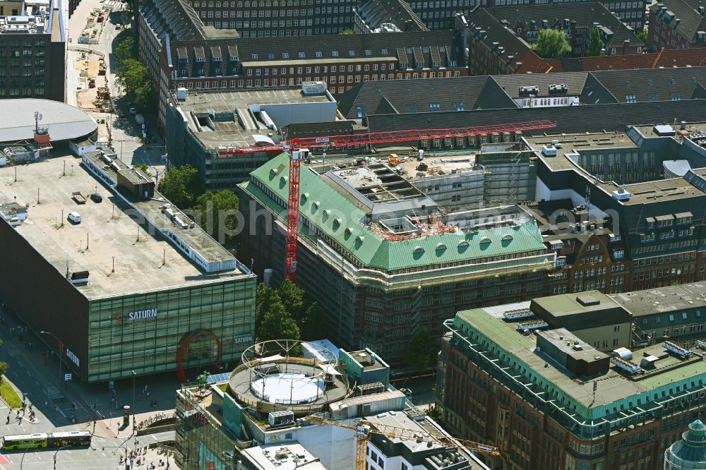 Hamburg from the bird's eye view: Partial demolition and reconstruction of the former department store building Neues Kloepperhaus on street Moenckebergstrasse - Bugenhagenstrasse - Lange Muehren in the district Altstadt in Hamburg, Germany