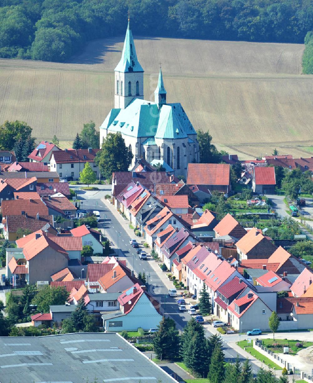 Effelder from the bird's eye view: Teilansicht der Gemeinde Effelder im Landkreis Eichsfeld in Thüringen. Die Kirche St. Alban mit ihrem weithin sichtbaren Kupferdach wird auch als Eichsfelder Dom bezeichnet und ist das Wahrzeichen des Dorfes. Partial view on municipality Effelder in borough Eichsfeld in Thuringia. The village´s landmark church St. Alban with its widely visible copper roof is also called Eichsfeld Cathedral.