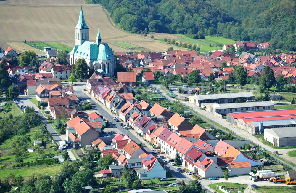 Effelder from the bird's eye view: Teilansicht der Gemeinde Effelder im Landkreis Eichsfeld in Thüringen. Die Kirche St. Alban mit ihrem weithin sichtbaren Kupferdach wird auch als Eichsfelder Dom bezeichnet und ist das Wahrzeichen des Dorfes. Partial view on municipality Effelder in borough Eichsfeld in Thuringia. The village´s landmark church St. Alban with its widely visible copper roof is also called Eichsfeld Cathedral.