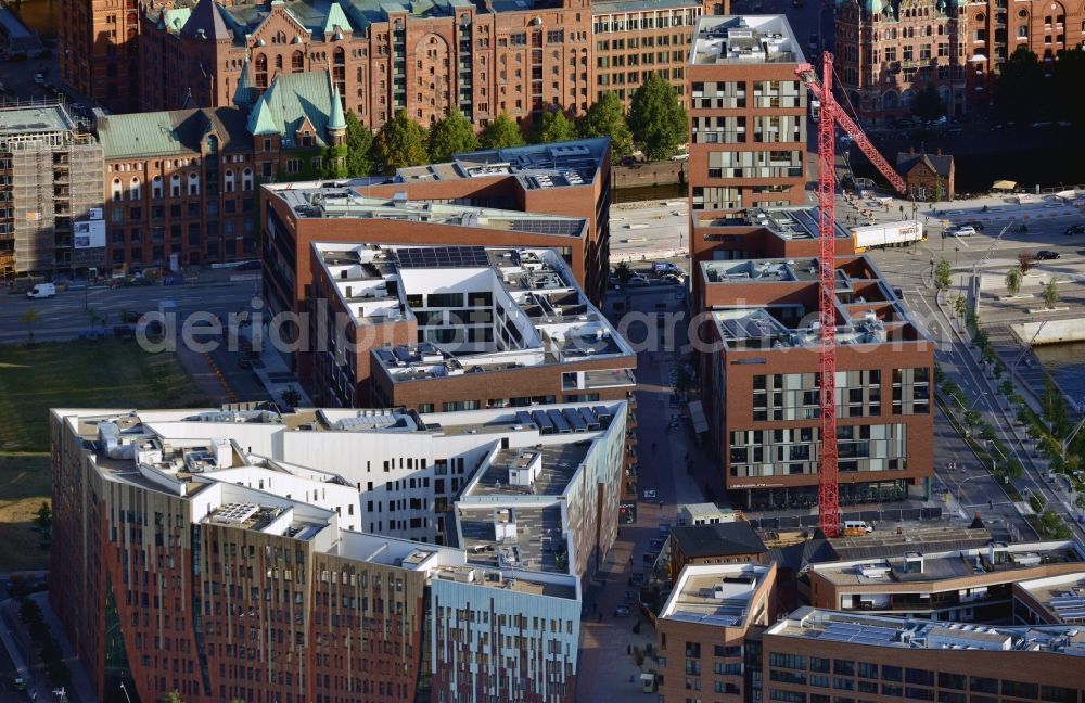 Aerial image Hamburg - Partial view of the newly built Ueberseequartier with look on residential, office and retail buildings near Osakaallee / corner Am Sandtorkai in Hafencity in Hamburg