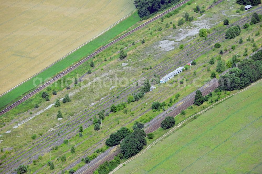 Aerial photograph NEUENHAGEN - Parts of the railway road between Neuenhagen and Fredersdorf close to Berlin in the state of Brandenburg. Parts of the railroad tracks belong to the S-Bahn (fast train) and freight railroad system. Inbetween some parts of the railroad are disused