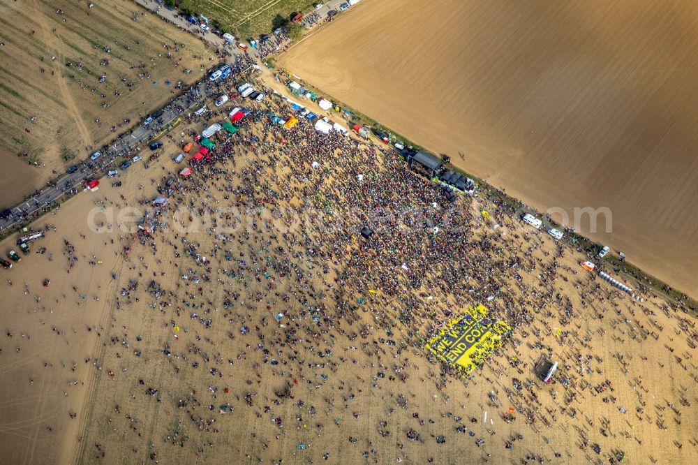 Aerial photograph Hambach - Participant of a political protest demonstration against the clearing of the forest Hambacher Forst in Hambach in the state North Rhine-Westphalia, Germany