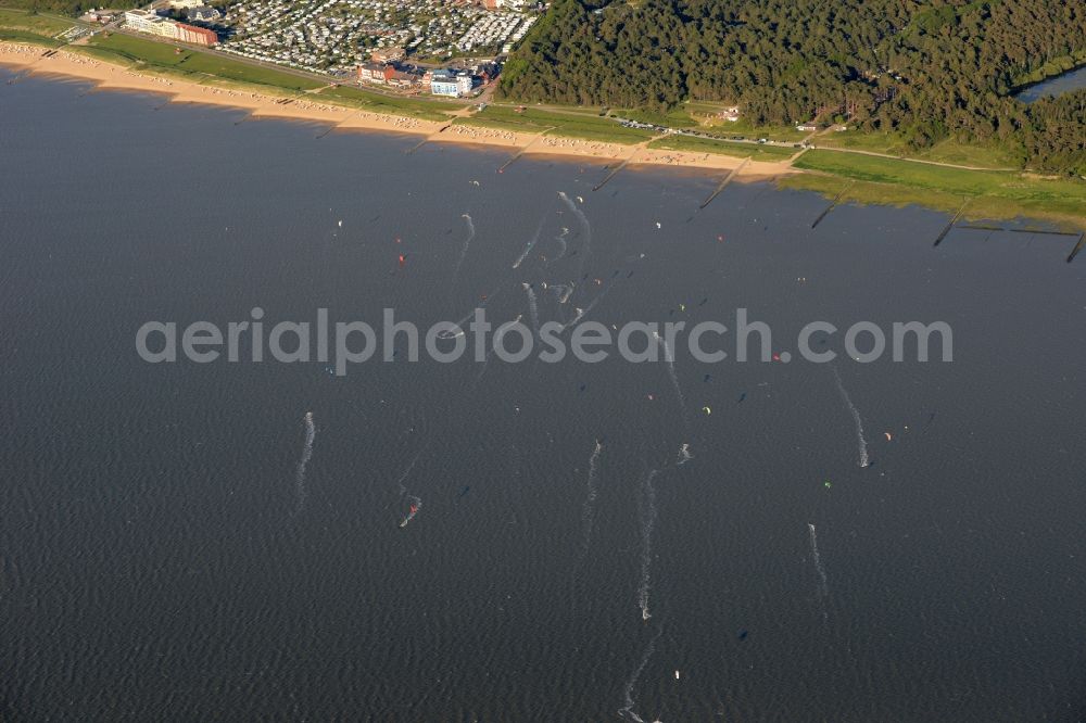 Cuxhaven from above - Participants of the sporting event kitesurfing at Sahlenburg beach in Cuxhaven in the state Lower Saxony