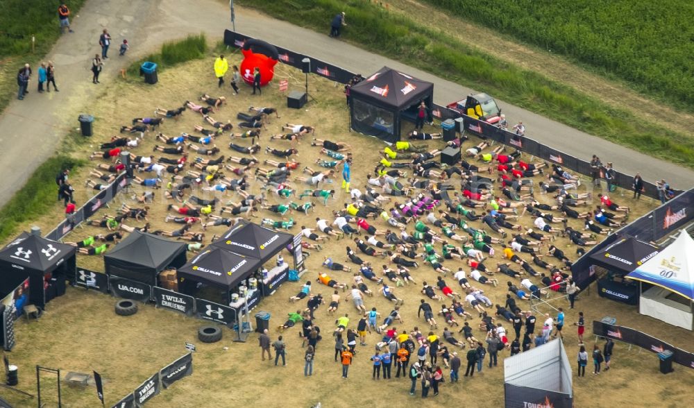 Aerial image Arnsberg - Participants of the sporting event Tough Mudder at the event area in Arnsberg in the state North Rhine-Westphalia