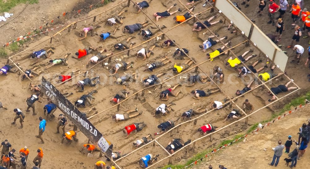 Arnsberg from the bird's eye view: Participants of the sporting event Tough Mudder at the event area in Arnsberg in the state North Rhine-Westphalia