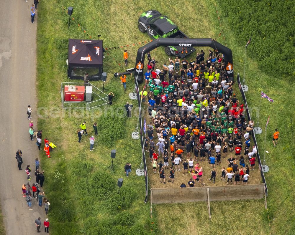 Aerial image Arnsberg - Participants of the sporting event Tough Mudder at the event area in Arnsberg in the state North Rhine-Westphalia