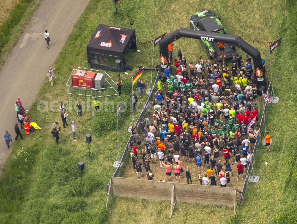 Arnsberg from above - Participants of the sporting event Tough Mudder at the event area in Arnsberg in the state North Rhine-Westphalia