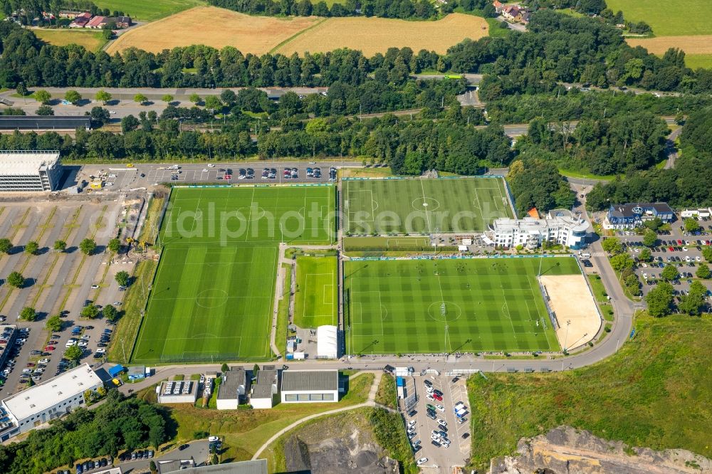 Gelsenkirchen from the bird's eye view: Participants of the training on the sports grounds Bundesliga team S04 on the football training pitches at Charly's Schalke in Gelsenkirchen in North Rhine-Westphalia