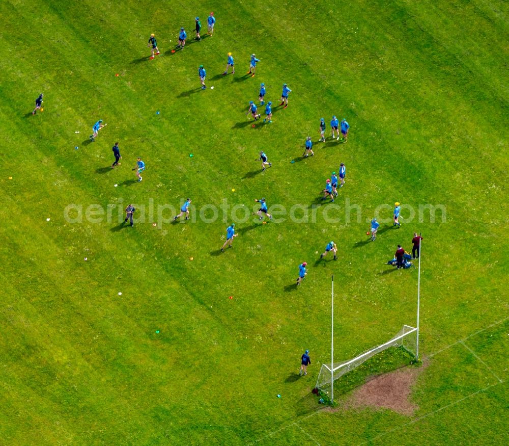 Ennis from the bird's eye view: Participants of the training at the sport area the soccer field in Ennis in Clare, Ireland