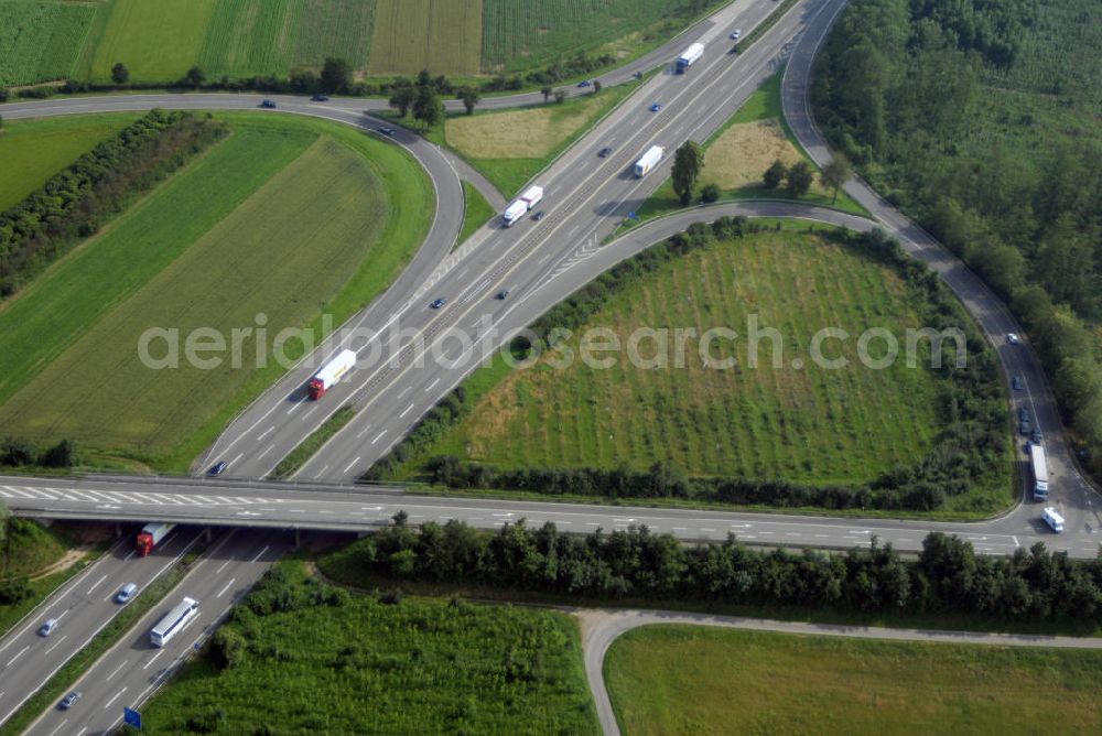 Bühl / OT Vimbuch from the bird's eye view: Blick auf die Abfahrt Vimbuch der A5 nahe Bühl. Die A5 ist Teil der HaFraBa (Hamburg Frankfurt Basel) vom Hattenbacher Dreieck bis an die Grenze zur Schweiz. Auf 445 km Länge bestehen Verbindungen u.a. zum französischen Autobahnnetz (bis Barcelona) und zur Verbindung Holland - Österreich. Als Teil der HaFraBa E.V. (Nord-Süd Verbindung) ist sie eine der meist befahrensten Strassen Europas (in Deutschland Platz 9).