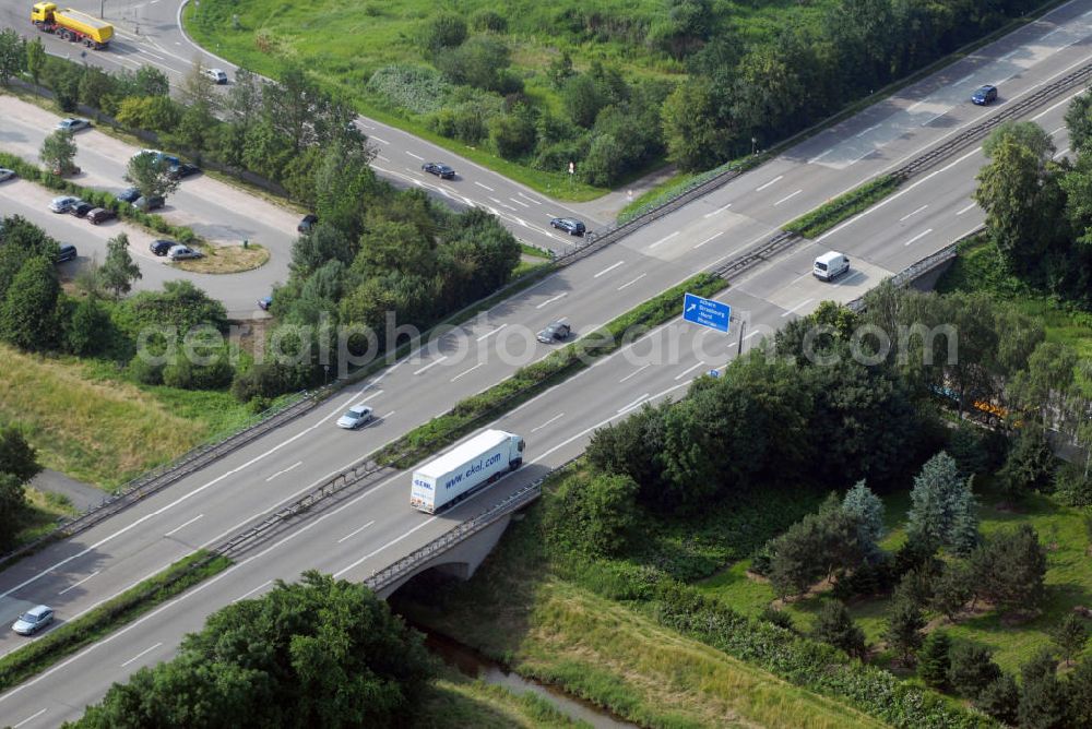 Achern from the bird's eye view: Blick auf die A5 nahe Achern. Die A5 ist Teil der HaFraBa (Hamburg Frankfurt Basel) vom Hattenbacher Dreieck bis an die Grenze zur Schweiz. Die Acher fließt in ost-westlicher Richtung vom Schwarzwald in den Rhein, parallel zur südlich verlaufenden Rench und zur nördlich verlaufenden Oos. Auf 445 km Länge bestehen Verbindungen u.a. zum französischen Autobahnnetz (bis Barcelona) und zur Verbindung Holland - Österreich. Als Teil der HaFraBa E.V. (Nord-Süd Verbindung) ist sie eine der meist befahrensten Strassen Europas (in Deutschland Platz 9).