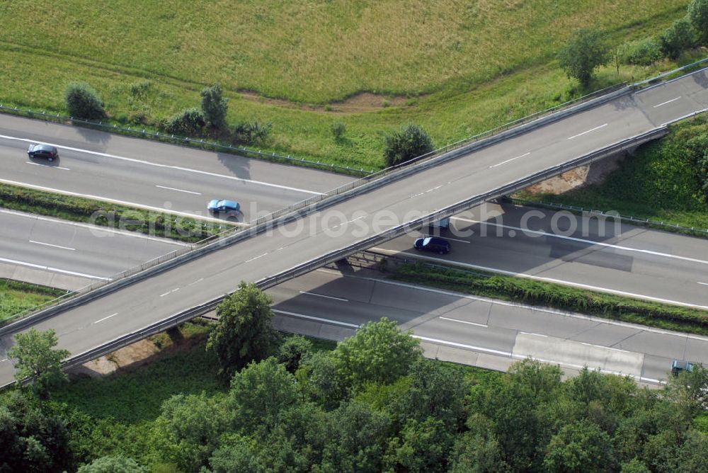 Ottersweier / OT Unzhurst from the bird's eye view: Blick auf eine Brücke der A5 bei Unzhurst nahe Ottersweier. Die A5 ist Teil der HaFraBa (Hamburg Frankfurt Basel) vom Hattenbacher Dreieck bis an die Grenze zur Schweiz. Auf 445 km Länge bestehen Verbindungen u.a. zum französischen Autobahnnetz (bis Barcelona) und zur Verbindung Holland - Österreich. Als Teil der HaFraBa E.V. (Nord-Süd Verbindung) ist sie eine der meist befahrensten Strassen Europas.