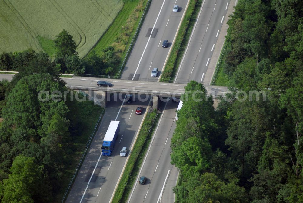 Ottersweier / OT Unzhurst from the bird's eye view: Blick auf eine Brücke der A5 bei Unzhurst nahe Ottersweier. Die A5 ist Teil der HaFraBa (Hamburg Frankfurt Basel) vom Hattenbacher Dreieck bis an die Grenze zur Schweiz. Auf 445 km Länge bestehen Verbindungen u.a. zum französischen Autobahnnetz (bis Barcelona) und zur Verbindung Holland - Österreich. Als Teil der HaFraBa E.V. (Nord-Süd Verbindung) ist sie eine der meist befahrensten Strassen Europas.