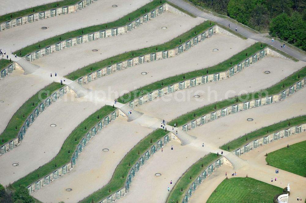 Potsdam from above - View of the fountain in the park of castle Sanssouci in Potsdam. It was built in 1745 together with the flower garden in the Baroque style in the order of the Prussian King Frederick II