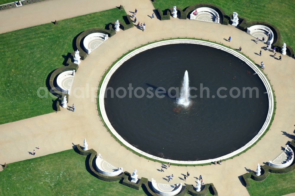 Potsdam from above - View of the fountain in the park of castle Sanssouci in Potsdam. It was built in 1745 together with the flower garden in the Baroque style in the order of the Prussian King Frederick II