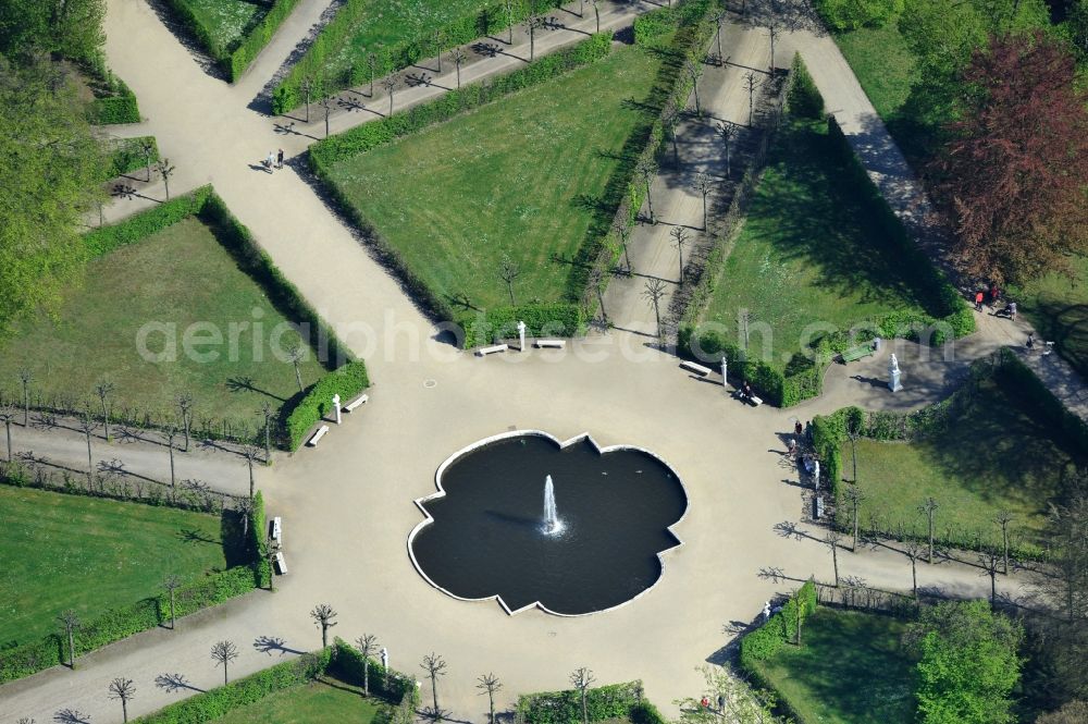 Potsdam from above - View of the fountain in the park of castle Sanssouci in Potsdam. It was built in 1745 together with the flower garden in the Baroque style in the order of the Prussian King Frederick II