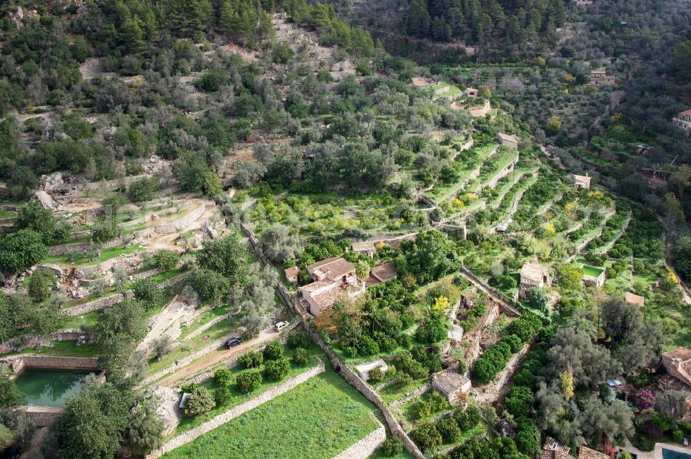 Fornalutx from the bird's eye view: Terrace-shaped houses and orchards in Fornalutx on the Balearic Islands in Spain