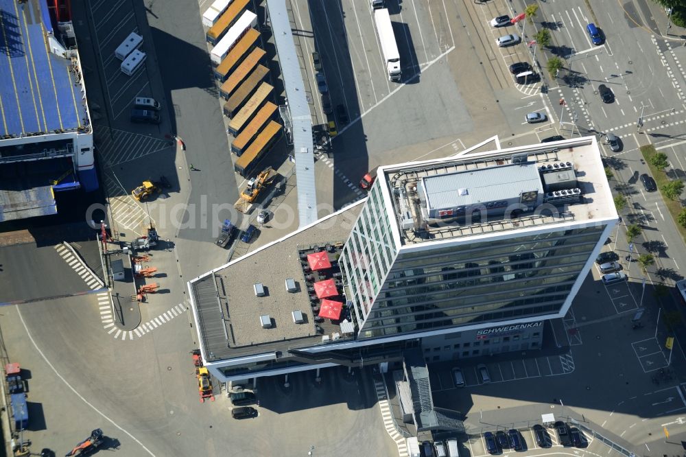 Kiel from the bird's eye view: Terminal building on Schwedenkai in Kiel in the state of Schleswig-Holstein. The architectural distinct building was shaped after a ship and includes offices, a restaurant and a navy terminal