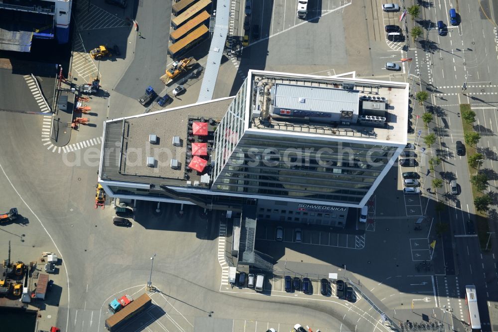 Aerial image Kiel - Terminal building on Schwedenkai in Kiel in the state of Schleswig-Holstein. The architectural distinct building was shaped after a ship and includes offices, a restaurant and a navy terminal