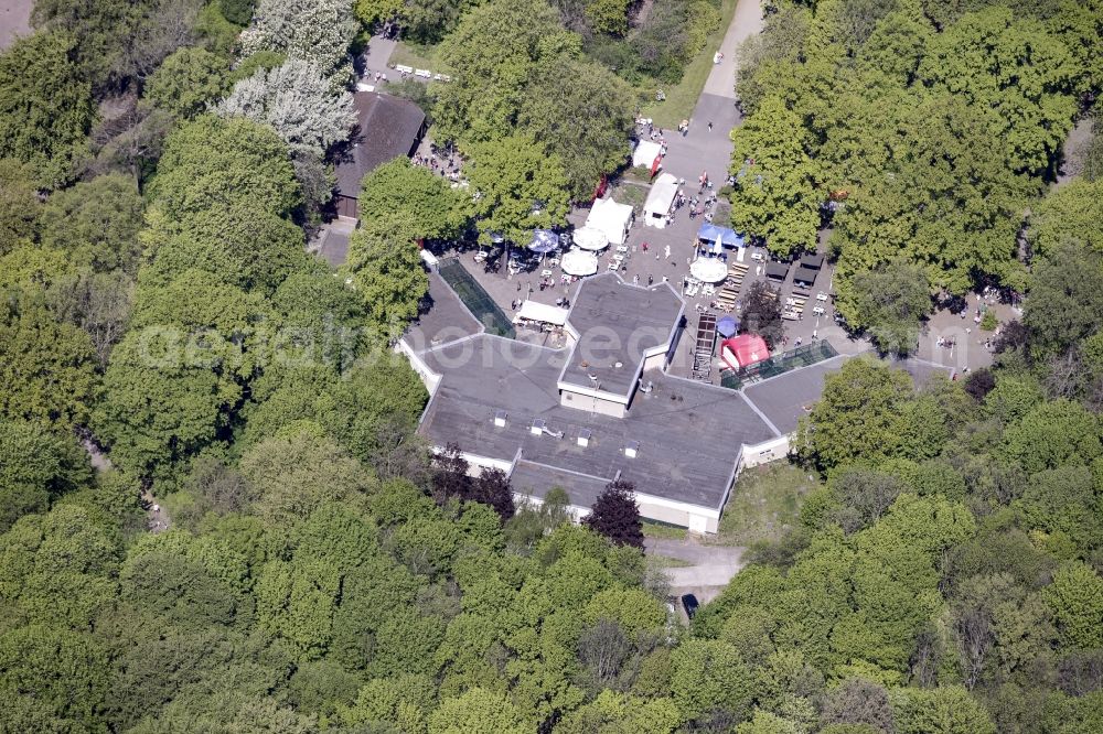 Berlin from the bird's eye view: Visitors at Terrassencafe in the zoo Tierpark in the Friedrichsfelde part of the district of Lichtenberg in Berlin, Germany