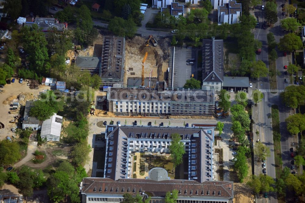 Aerial image Berlin - In the former headquarters of the U.S. forces in the district of Dahlem in Berlin is currently being created, the real estate site The metropolitan gardens. Quality apartments and suites in the former barracks and administrative buildings integrated from the Terraplan estate and fiduciary mbH at the corner Clayallee Saagemunder road 