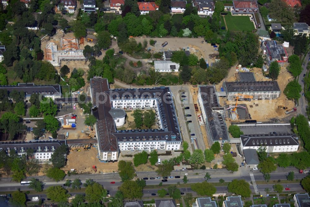 Aerial photograph Berlin - In the former headquarters of the U.S. forces in the district of Dahlem in Berlin is currently being created, the real estate site The metropolitan gardens. Quality apartments and suites in the former barracks and administrative buildings integrated from the Terraplan estate and fiduciary mbH at the corner Clayallee Saagemunder road 