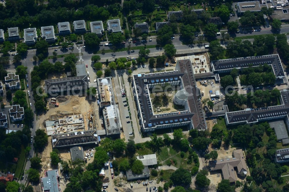 Aerial photograph Berlin - In the former headquarters of the U.S. forces in the district of Dahlem in Berlin is currently being created, the real estate site The metropolitan gardens. Quality apartments and suites in the former barracks and administrative buildings integrated from the Terraplan estate and fiduciary mbH at the corner Clayallee Saagemunder road 