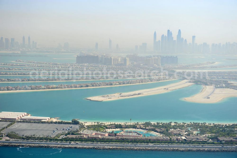 Dubai from above - View of the archipelago The Palm Jumeirah, a palm-shaped island in the Persian Gulf in Dubai