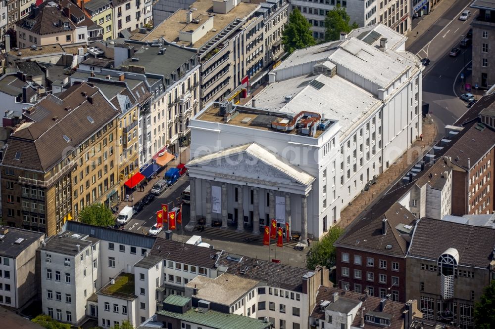 Aerial photograph Aachen - Theatre Aachen on Theatre square in the city centre of Aachen in the state of North Rhine-Westphalia. Aachen is a spa town, diocesan town and the western-most major city of Germany. The historic city centre is located in the Mitte part of the city and includes the long white building of the theatre