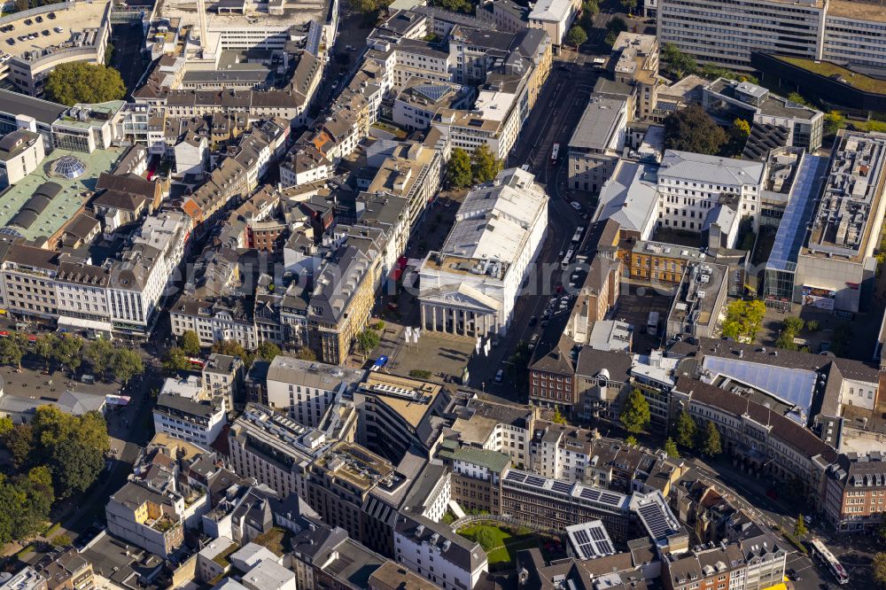 Mitte from the bird's eye view: Theater Aachen on the Theaterplatz in the city center of Aachen in the federal state of North Rhine-Westphalia. Aachen is a district-free spa town, bishopric and the westernmost city in Germany. The striking white, elongated building of the theater is located in the historic city center in the Mitte district