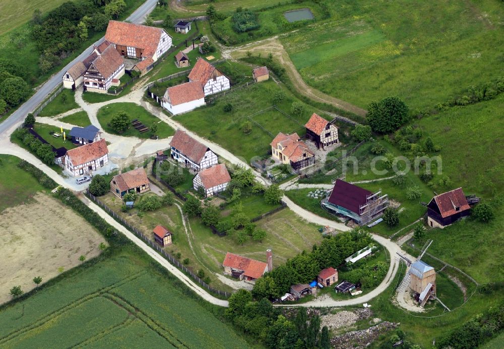 Hohenfelden from the bird's eye view: The Thuringian open air museum Hohenfelden in the state of Thuringia is an artificially created village in the rural and rural buildings in different regions of Thuringia are presented. In this picture the building ensemble is to see Am Eichenberg, consisting of farm buildings and a windmill