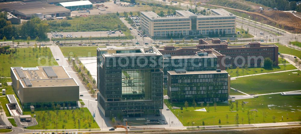 Essen from the bird's eye view: Blick auf das Thyssenhaus im neu errichteten Ensemble des ThyssenKrupp Hauptquartier als Kern des Krupp-Gürtels in Essen. Auf dem zwischen 1945 und 2007 größtenteils brachliegenden Gelände der ehemaligen Kruppschen Gussstahlfabrik, die im Zweiten Weltkrieg teils zerstört, die Reste später demontiert und nicht wieder aufgebaut wurden, ist das Hauptquartier der ThyssenKrupp AG (Krupp und Thyssen fusionierten 1999) am 17. Juni 2010 offiziell eröffnet worden. The Thyssen House in the newly established ensemble of ThyssenKrupp's headquarters as the core of the Krupp Belt in Essen.