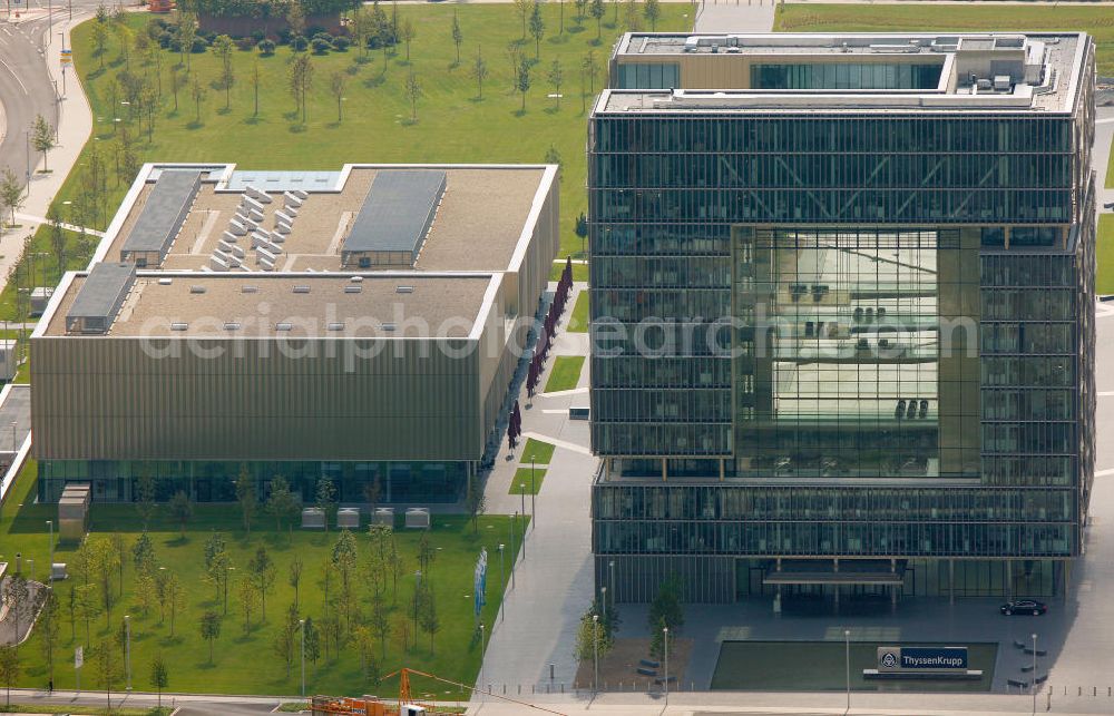 Essen from above - Blick auf das Thyssenhaus im neu errichteten Ensemble des ThyssenKrupp Hauptquartier als Kern des Krupp-Gürtels in Essen. Auf dem zwischen 1945 und 2007 größtenteils brachliegenden Gelände der ehemaligen Kruppschen Gussstahlfabrik, die im Zweiten Weltkrieg teils zerstört, die Reste später demontiert und nicht wieder aufgebaut wurden, ist das Hauptquartier der ThyssenKrupp AG (Krupp und Thyssen fusionierten 1999) am 17. Juni 2010 offiziell eröffnet worden. The Thyssen House in the newly established ensemble of ThyssenKrupp's headquarters as the core of the Krupp Belt in Essen.