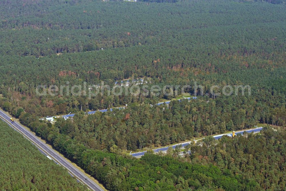 Ebersbach from the bird's eye view: Stalled equipment for poultry farming and poultry production in a forest area on street Zschornaer Strasse in Ebersbach in the state Saxony, Germany