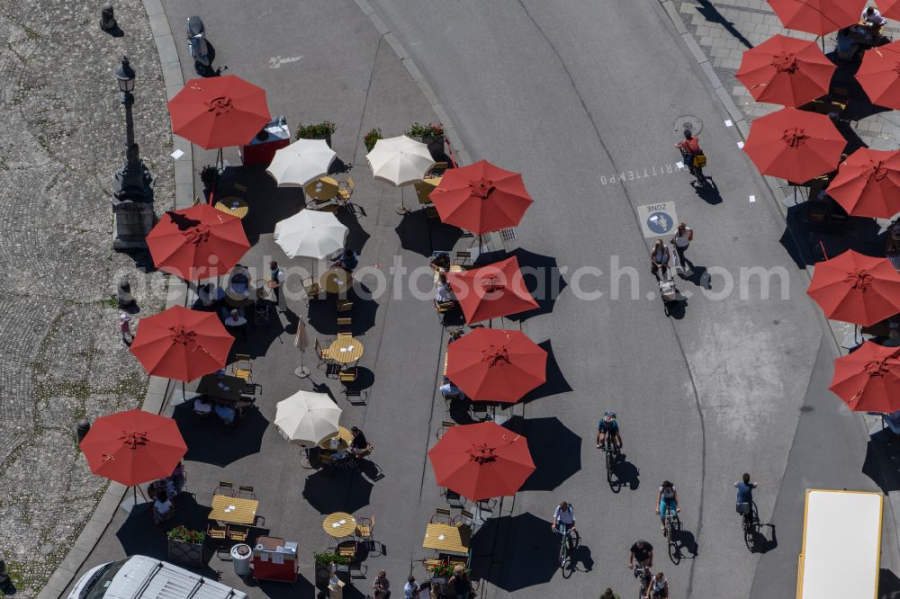 München from above - Tables and benches of open-air restaurant in Munich in the state Bavaria, Germany