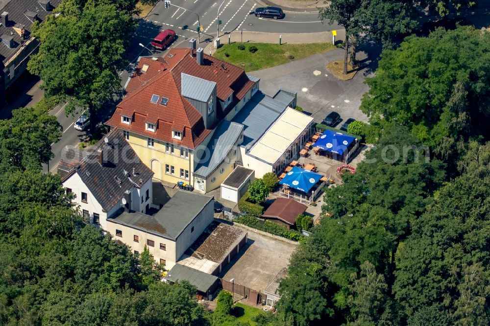 Dorsten from the bird's eye view: Tables and benches of the open-air restaurant Steak House El Tori with beer garden on the Borkener street in Dorsten in North Rhine-Westphalia