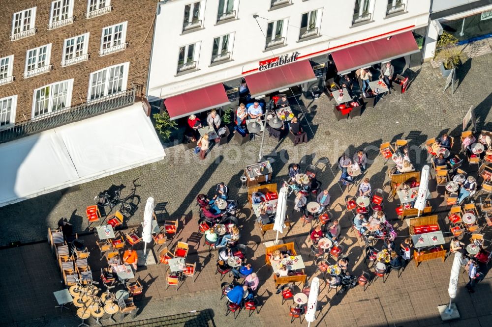 Dorsten from the bird's eye view: Tables and benches of open-air restaurants in old town in Dorsten in the state North Rhine-Westphalia