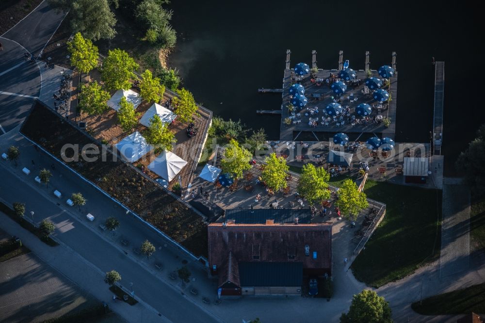 Spalt from the bird's eye view: Tables and benches of open-air restaurants Grosser Brombachsee in Spalt in the state Bavaria, Germany