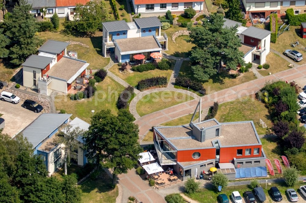 Waren (Müritz) from above - Tables and benches of the outdoor restaurants on harbor restaurant Reecksee Marina Eldenburg in Waren (Mueritz) in Mecklenburg-Vorpommern