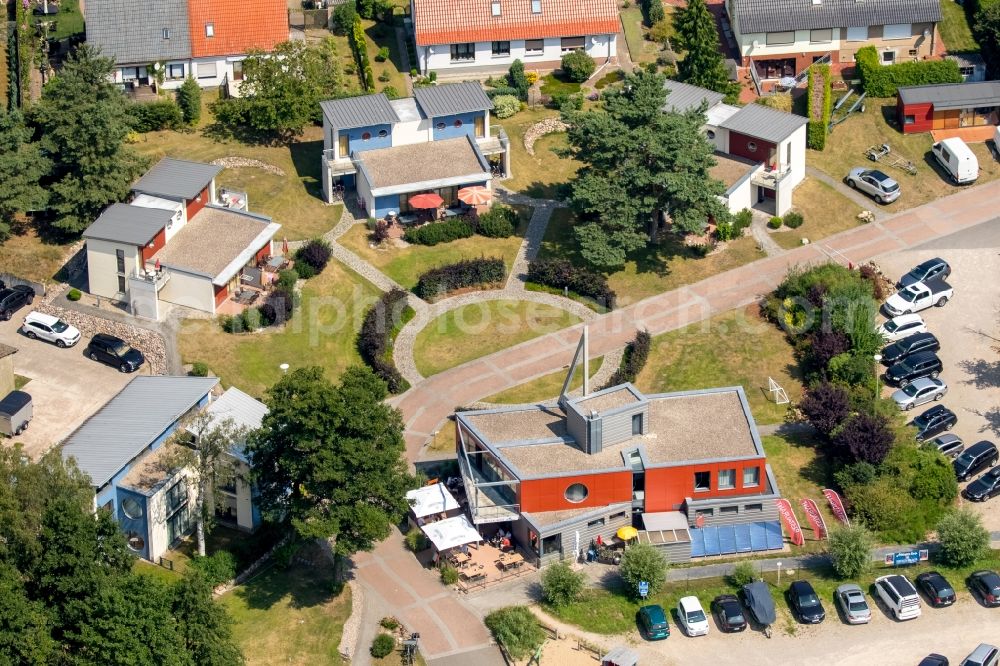 Waren (Müritz) from above - Tables and benches of the outdoor restaurants on harbor restaurant Reecksee Marina Eldenburg in Waren (Mueritz) in Mecklenburg-Vorpommern