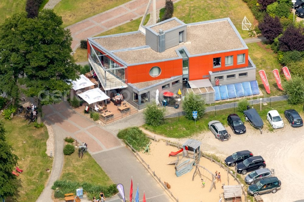 Waren (Müritz) from the bird's eye view: Tables and benches of the outdoor restaurants on harbor restaurant Reecksee Marina Eldenburg in Waren (Mueritz) in Mecklenburg-Vorpommern