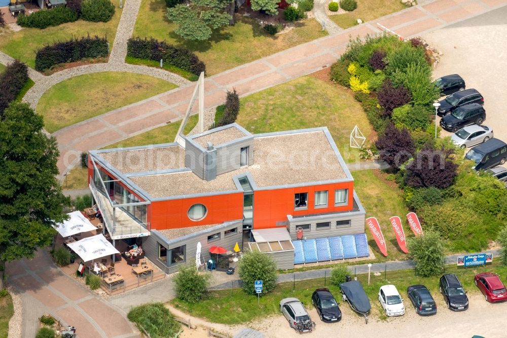 Aerial image Waren (Müritz) - Tables and benches of the outdoor restaurants on harbor restaurant Reecksee Marina Eldenburg in Waren (Mueritz) in Mecklenburg-Vorpommern