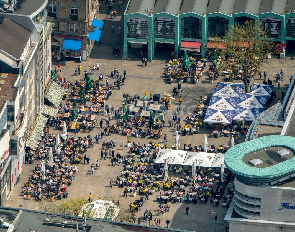 Dortmund from the bird's eye view: Tables and benches of open-air restaurants on place Alter Markt in Dortmund in the state North Rhine-Westphalia