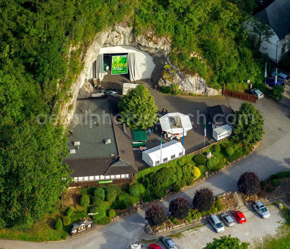 Balve from above - Tables and benches of open-air restaurants Restaurant zur Hoehle in front of the event location Balver Hoehle in Balve in the state North Rhine-Westphalia