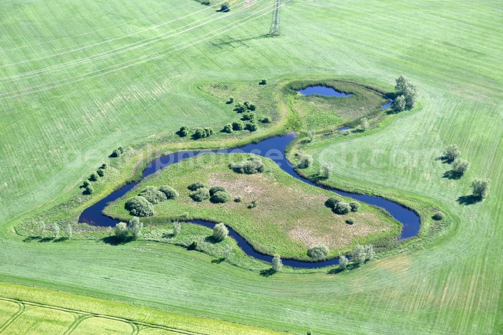 Dassow from above - Pool oases on harvested agricultural fields in Dassow in the state Mecklenburg - Western Pomerania, Germany