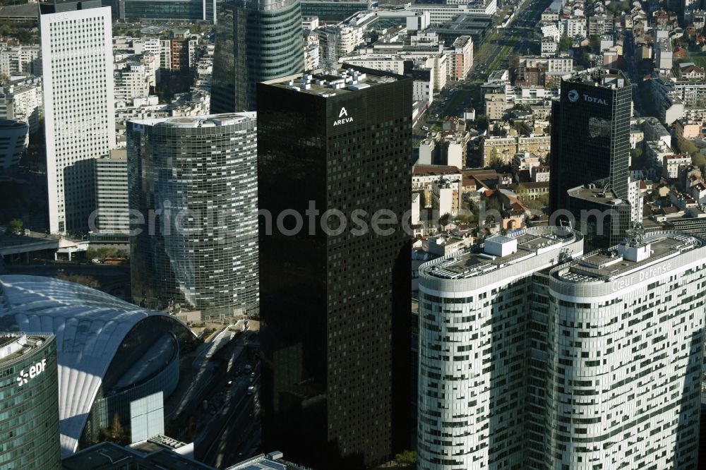 Paris from above - Tour Areva amidst the highrise ensemble in the office and highrise quarter La Defense in Paris in Ile-de-France, France