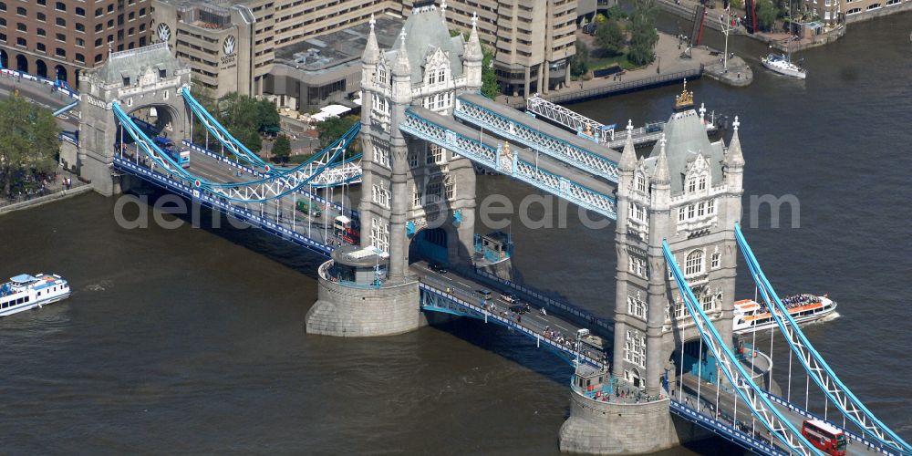 London from the bird's eye view: River - bridge structure and landmark of the Victorian bascule and suspension bridge Tower Bridge for crossing the river Thames on Tower Bridge Rd in London in England, United Kingdom