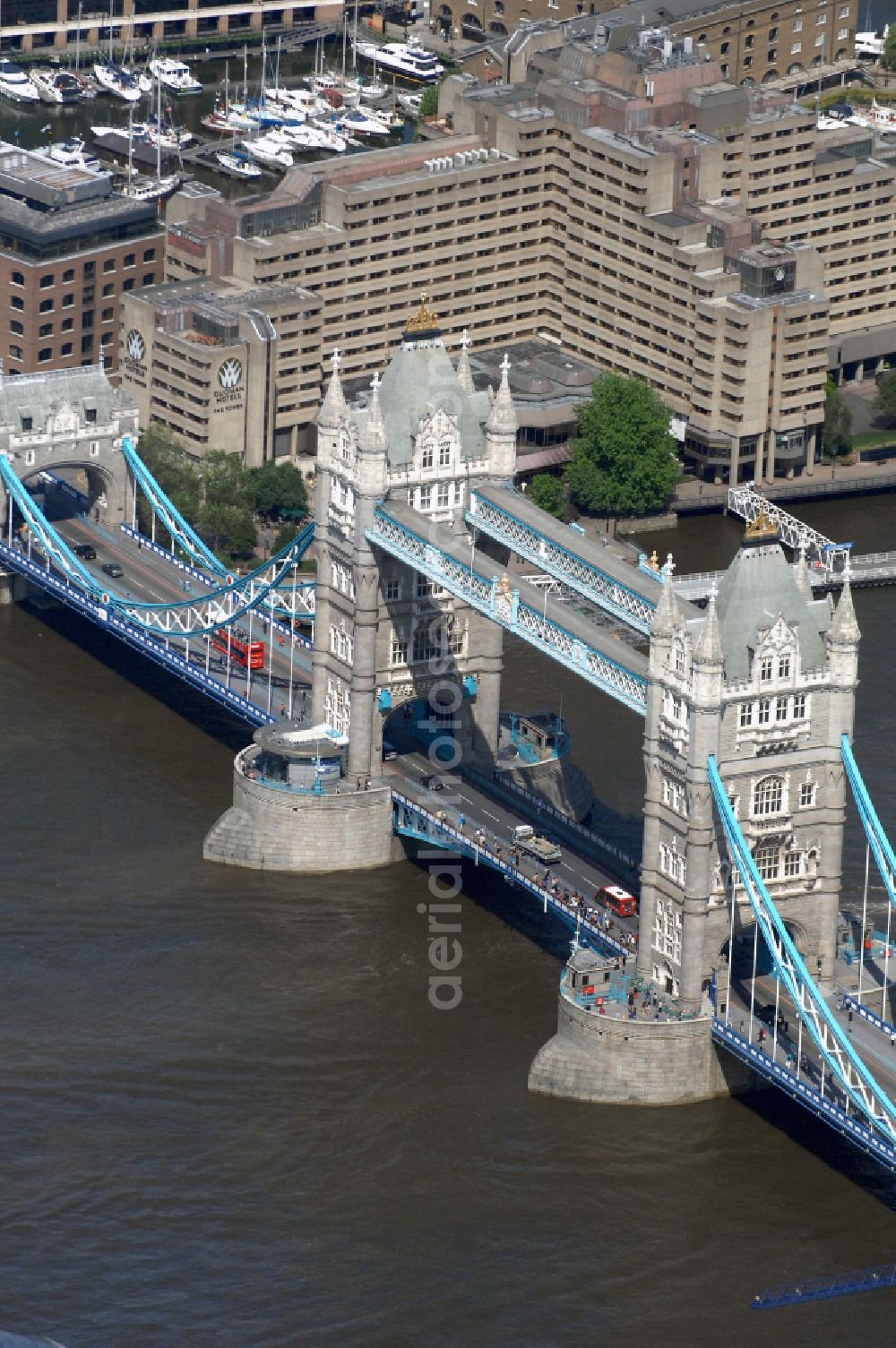 Aerial photograph London - River - bridge structure and landmark of the Victorian bascule and suspension bridge Tower Bridge for crossing the river Thames on Tower Bridge Rd in London in England, United Kingdom